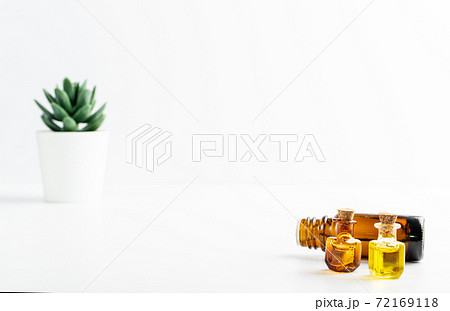 Essential Oil, Tincture or Extract Mockup with Small Bottles Essential Oil, Tincture or Extract Mockup with Small Bottles 72169118
