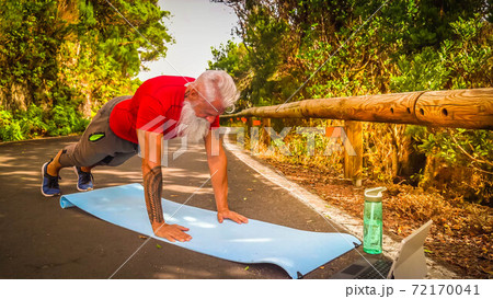 Senior man doing sport exercises Senior man doing sport exercises 72170041
