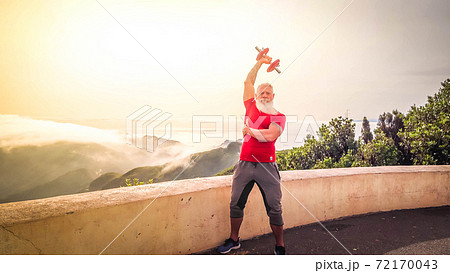Senior man doing sport exercises Senior man doing sport exercises 72170043
