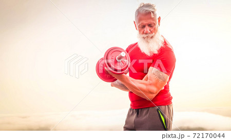Senior man doing sport exercises Senior man doing sport exercises 72170044