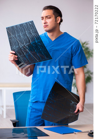 Young male doctor radiologist working in the clinic 72170222