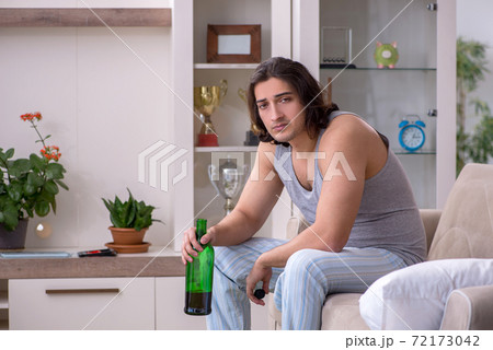 Man ex-champion suffering from alcoholism at home Man ex-champion suffering from alcoholism at home 72173042