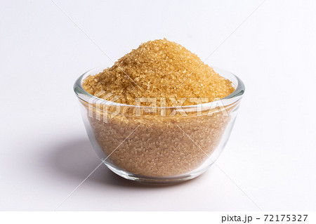 brown sugar In glass cup isolated on white background 72175327
