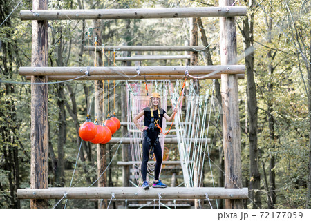 Woman in a rope park Woman in a rope park 72177059