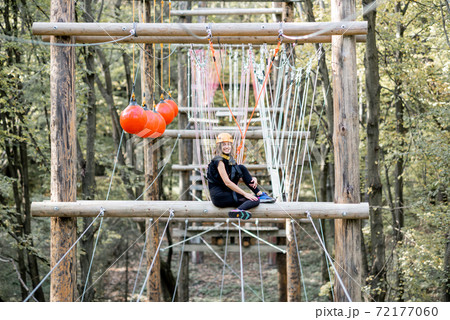 Woman in a rope park Woman in a rope park 72177060