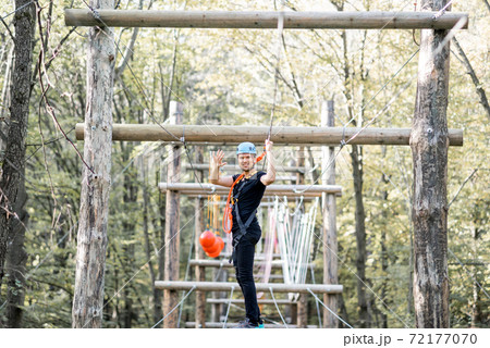 Man in a rope park Man in a rope park 72177070