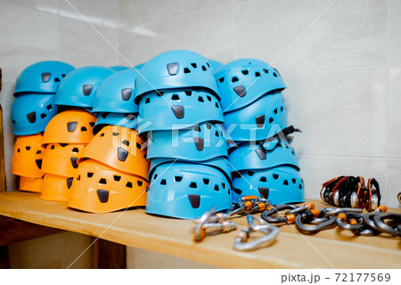 Climbing hardhats at warehouse Climbing hardhats at warehouse 72177569