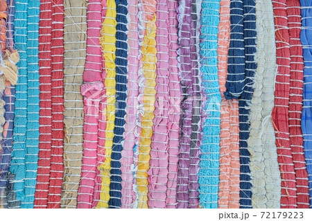 Close-up of rug woven from colored threads Close-up of rug woven from colored threads 72179223