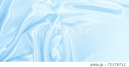 Smooth elegant blue silk or satin luxury cloth texture as abstract background. Luxurious background design Smooth elegant blue silk or satin luxury cloth texture as abstract background. Luxurious background design 72179712