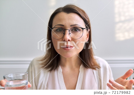 Female psychologist, psychiatrist looking at webcam, closeup face 72179982