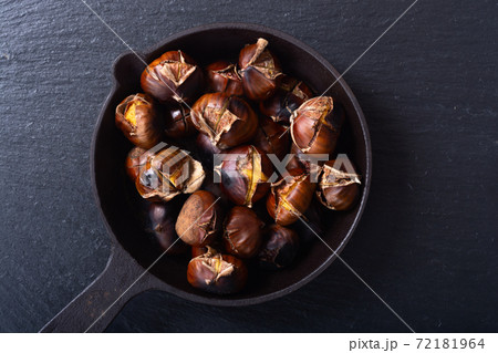 Tasty fried chestnut snack background 72181964