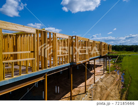 Wooden house in American beams the view of frame structure on a new development 72185666