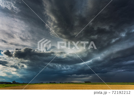 Storm clouds with shelf cloud and intense rain Storm clouds with shelf cloud and intense rain 72192212