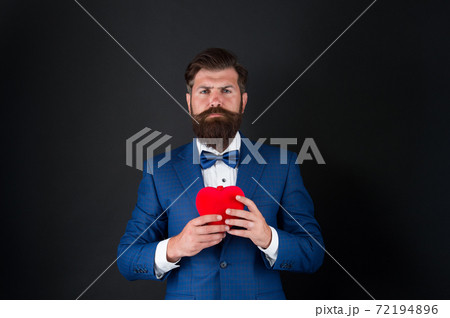 happy valentines day. tuxedo man with red heart. love 72194896