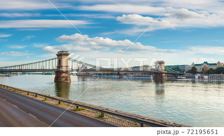 Chain bridge on river 72195651