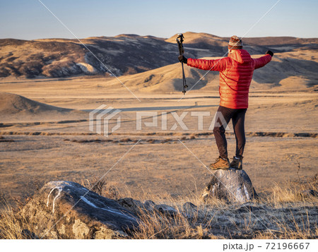 hiker at foothills of Rocky Mountains in northern Colorado 72196667