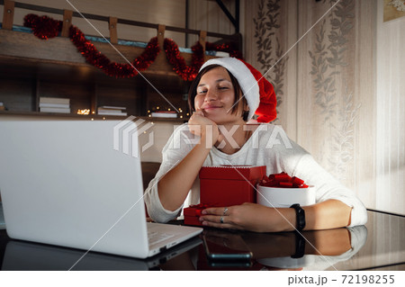 Concept of Christmas online shopping, buying gifts, congratulations over Internet. Concept of Christmas online shopping, buying gifts, congratulations over Internet. 72198255