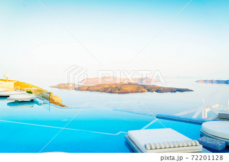 Pool and view of Santorini caldera 72201128