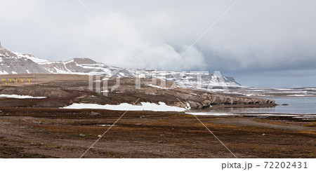 Mountain landscape and satellite dish in Ny Alesund, Svalbard islands 72202431