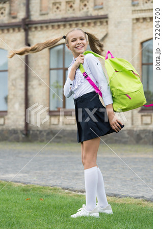 happy childhood. teen girl with backpack. pretty child little girl happy childhood. teen girl with backpack. pretty child little girl 72204700