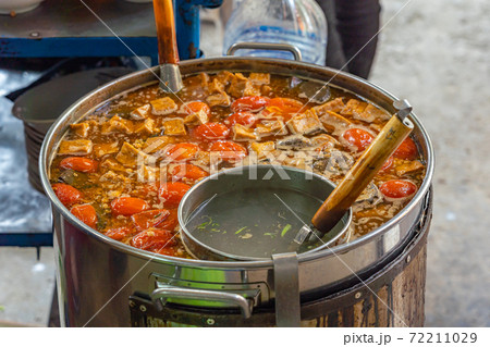 Pot of Vietnamese Bun Rieu soup at street food vendor Pot of Vietnamese Bun Rieu soup at street food vendor 72211029