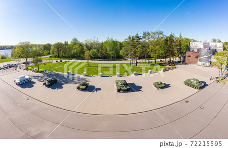 Aerial panoramic View at the Museum diorama in sunny summer day. Monument Soviet tanks. Kirovsk, Leningrad Region, Russia. Translation: "The Museum - panorama the Breakthrough", on tank "Leningrader" 72215595