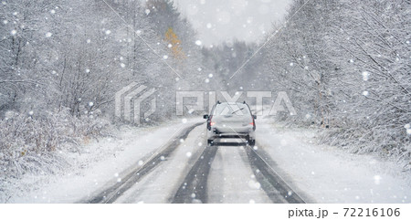 The car is driving on a winter road The car is driving on a winter road 72216106