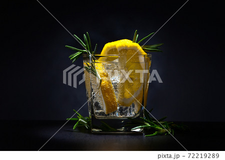 alcoholic drink with tonic, lemon and rosemary alcoholic drink with tonic, lemon and rosemary 72219289