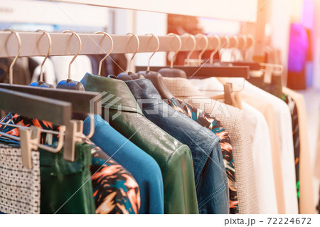 Things hang on hangers in the store 72224672