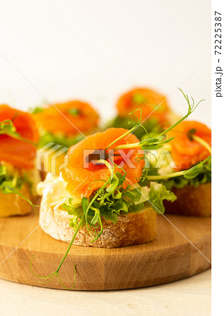 Canapes with red fish 72225387