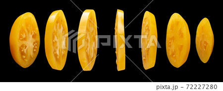 Tomato slices on black background, levitating 72227280