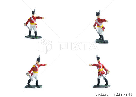 4 in 1 shot of handmade tin soldiers with sword on the white background 4 in 1 shot of handmade tin soldiers with sword on the white background 72237349