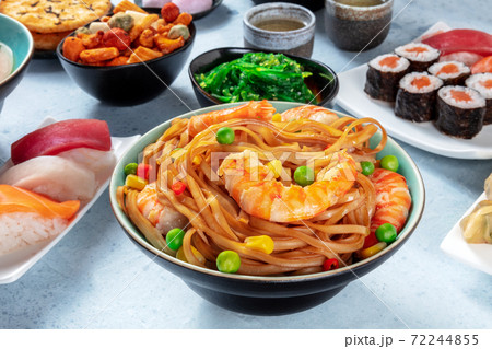 Japanese food. Stir fried noodles with shrimps, nigiri, maki etc 72244855