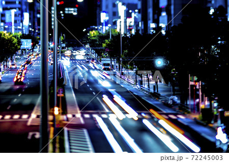 ミニチュア風の夜の青山通り 車の光跡 夜景イメージ の写真素材