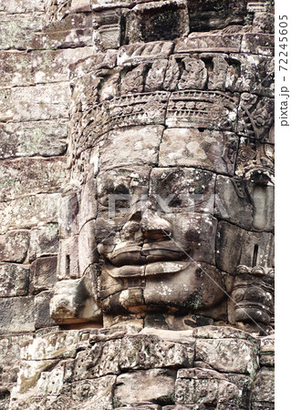 Giant stone face in Prasat Bayon Temple, Angkor Wat complex, Siem Reap, Cambodia 72245605