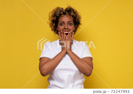 African american woman with hand on head for pain in head because of stress suffering migraine. 72247993