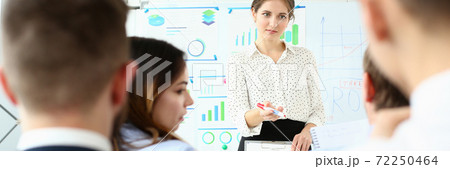 Pretty female in office 72250464