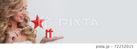 Girl with magic wand and holiday gift 72252015