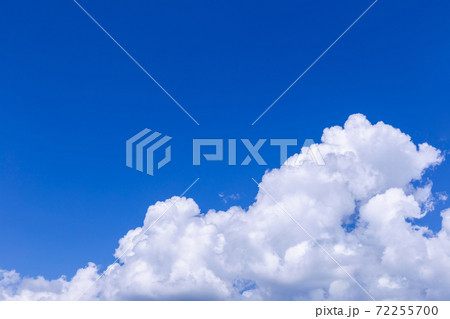 Blue sky background with white clouds on sunny day. Blue sky background with white clouds on sunny day. 72255700