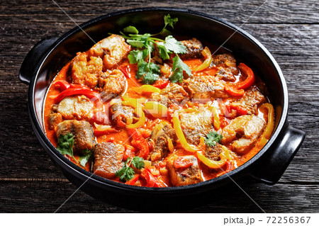 Moqueca baiana - brazilian fish stew with lime 72256367