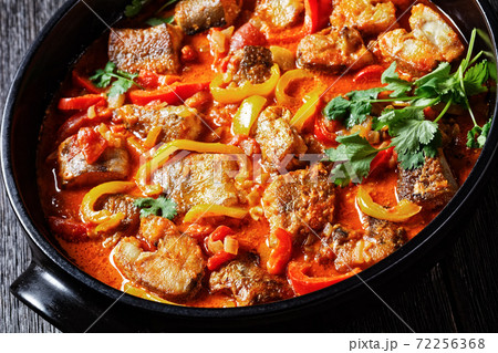 Moqueca baiana - brazilian fish stew with lime 72256368