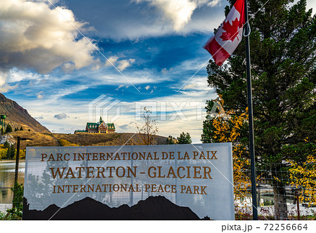 Waterton-Glacier International Peace Park in autumn foliage season. Waterton lake shore at dawn, beautiful fiery clouds in sunrise time. Waterton Lakes National Park, Alberta, Canada. Waterton-Glacier International Peace Park in autumn foliage season. Waterton lake shore at dawn, beautiful fiery clouds in sunrise time. Waterton Lakes National Park, Alberta, Canada. 72256664