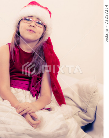 Little girl looking like santa elf. Little girl looking like santa elf. 72257254