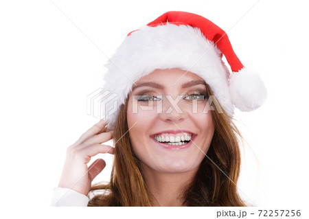Woman in santa claus hat free and happy 72257256
