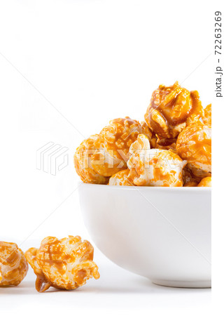Sweet caramel candy popcorn in a bowl Sweet caramel candy popcorn in a bowl 72263269