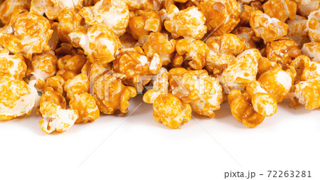 Sweet golden caramel candy popcorn macro 72263281