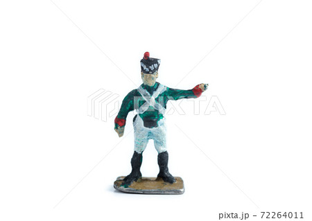 Photo of vintage metal soldier on the white background 72264011