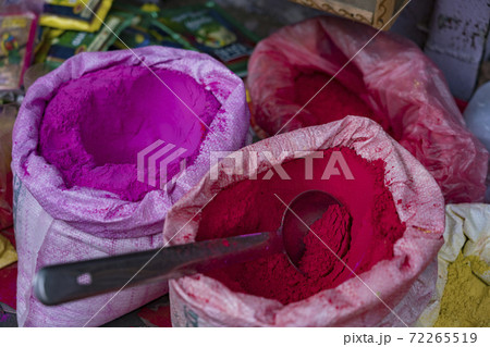 Bags of colored powdered paint sit waiting to be sold to Holi Festival celebrants 72265519
