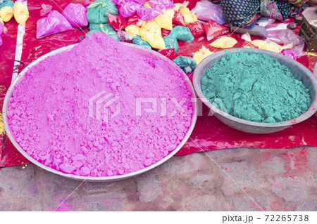 Bags of colored powdered paint sit waiting to be sold to Holi Festival celebrants Bags of colored powdered paint sit waiting to be sold to Holi Festival celebrants 72265738