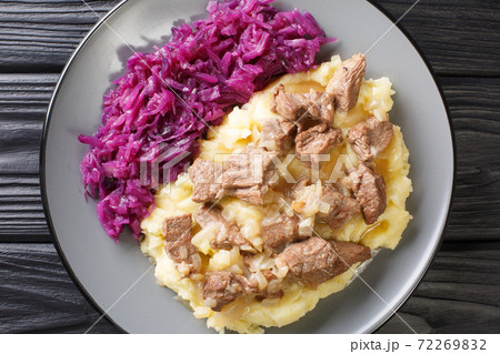 Hachee based on beef, onions, potatoes, red cabbage is a typical example of traditional Dutch cuisine closeup in the plate. horizontal top view 72269832